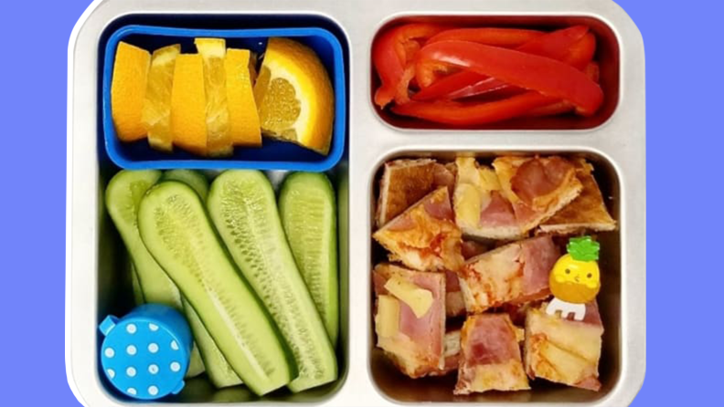 Little pizza bits in a kids' school lunch in a bento box