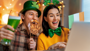 A couple wears St. Patrick's Day garb.