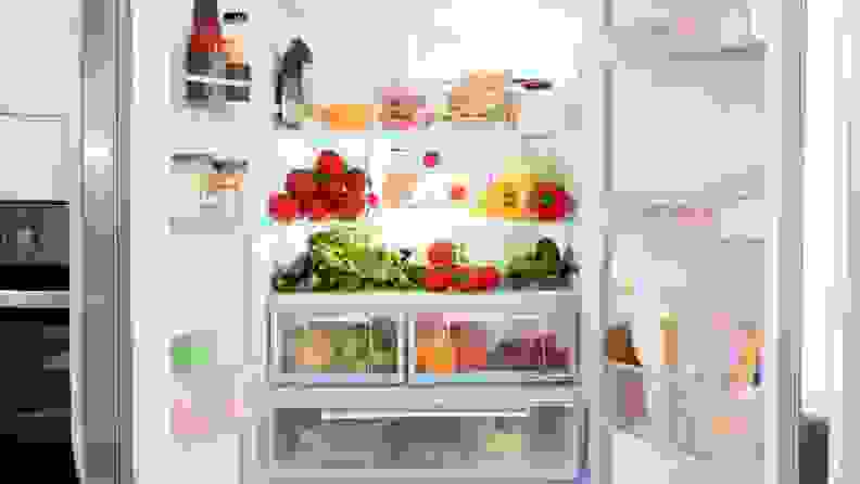 An open French door refrigerator