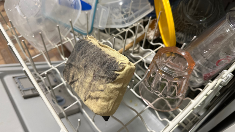 The head of the Grill Rescue brush on the top rack of a dishwasher.