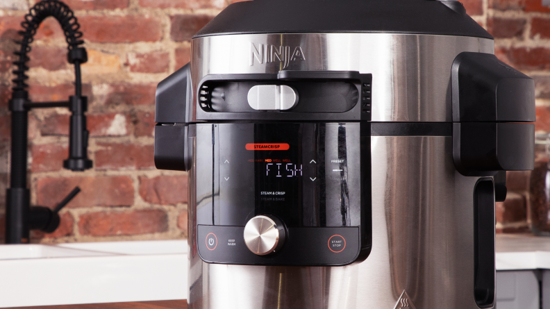 Close up of a Ninja Foodi multicooker on a kitchen countertop.