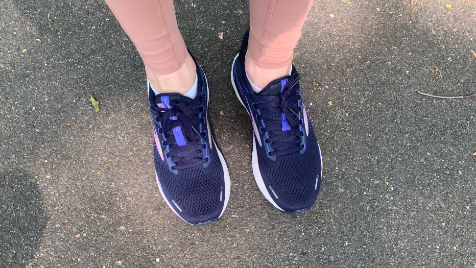 Staff Writer Lily Hartman wearing a pair of Brooks on a walk.