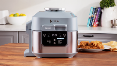 The Ninja Speedi air fryer sitting on a kitchen island.